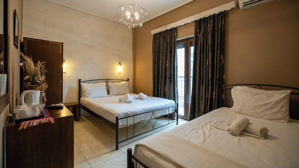 Фото Toti Boutique Rooms