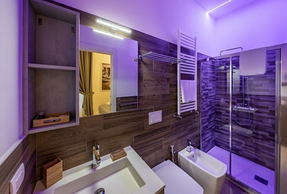 Фото Napoli Squares Suites