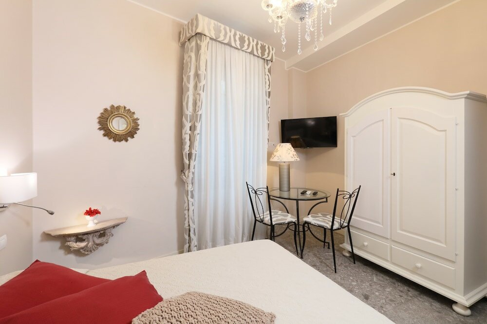 Фото Porta Di Mezzo Luxury B&b