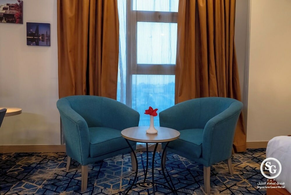 Фото Signature Guest Hotel