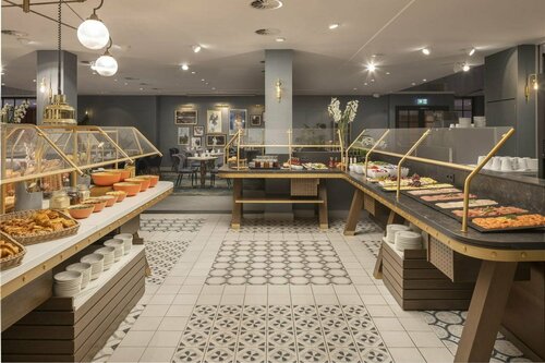 Внешний вид отеля Hilton Düsseldorf в Дюссельдорфе, фото 5