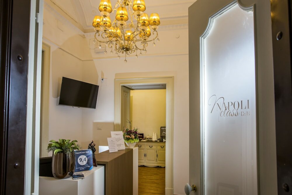Фото Napoli Class Luxury Rooms & Suites
