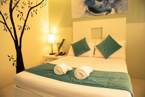 Внешний вид отеля Empire Suites Hotel в Пуэрто-Принсесе, фото 2