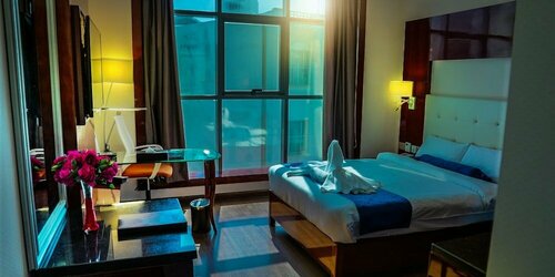 Гостиница Golden Tulip Headington Ruwi в Маскате