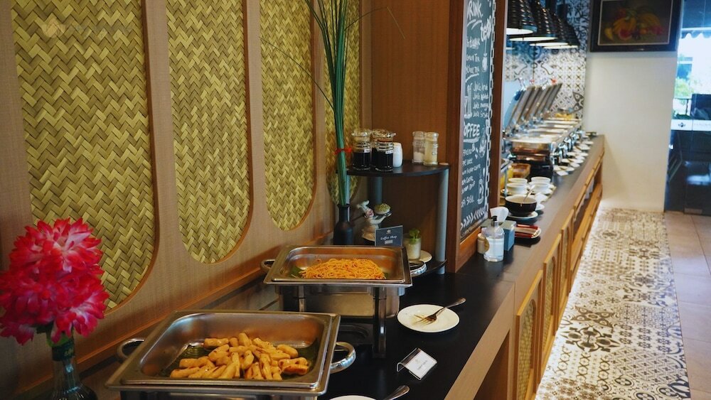 Фото Opi Indah Hotel