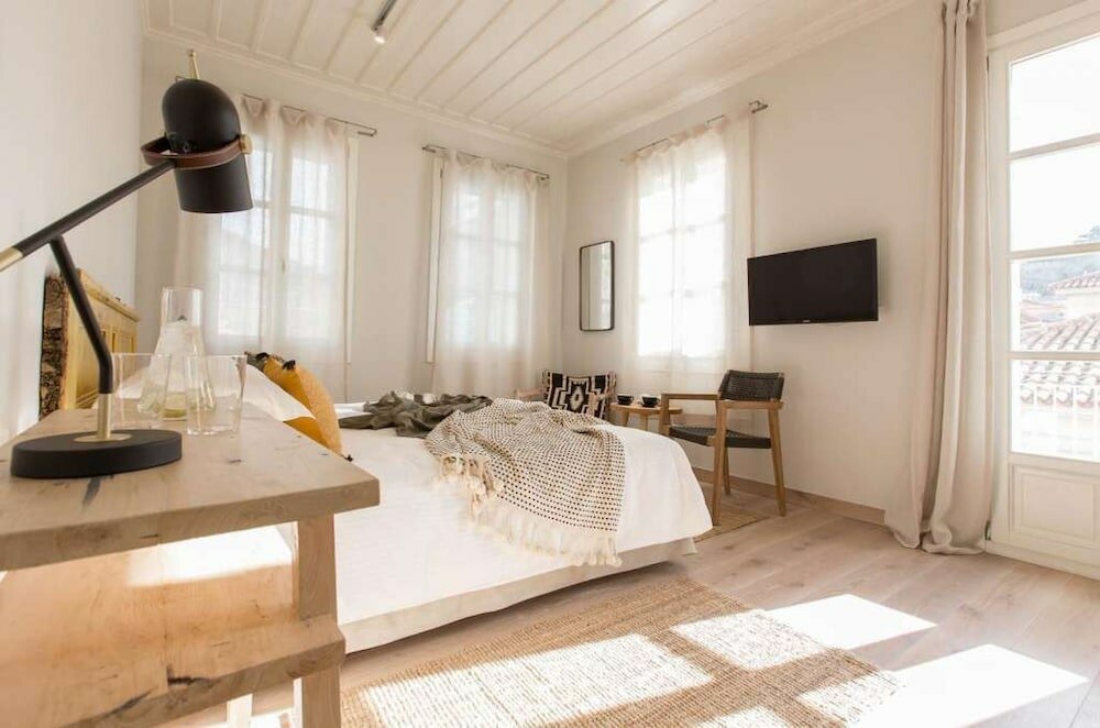 Фото Amymone Suites