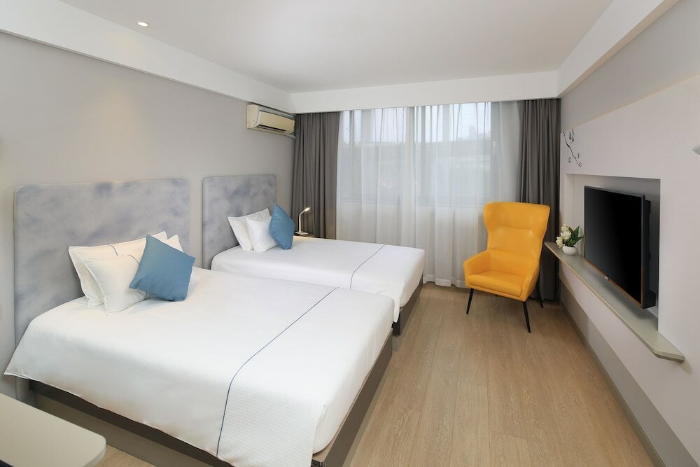 Фото Magnotel Hotel of Shanghai Jinjiang Park