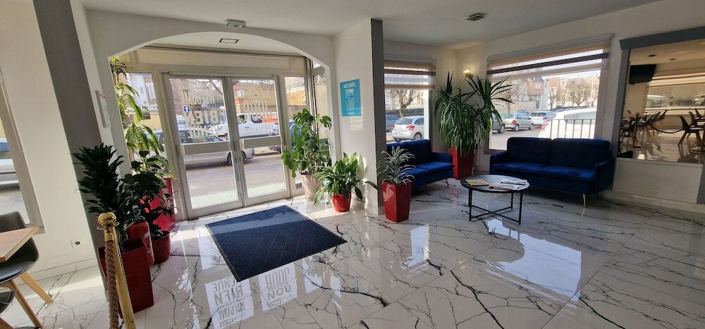 Фото Kyriad Direct Arpajon