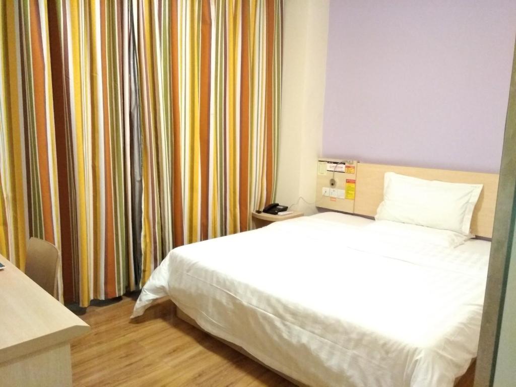 Фото 7Days Inn Chain Hotel Chongqing Wanzhou Gaosuntang Chongbai