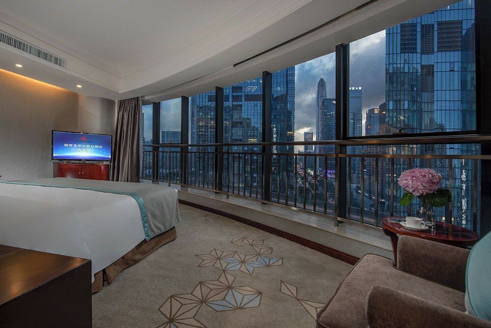 Фото Fuqinglong Huatian Holiday Hotel