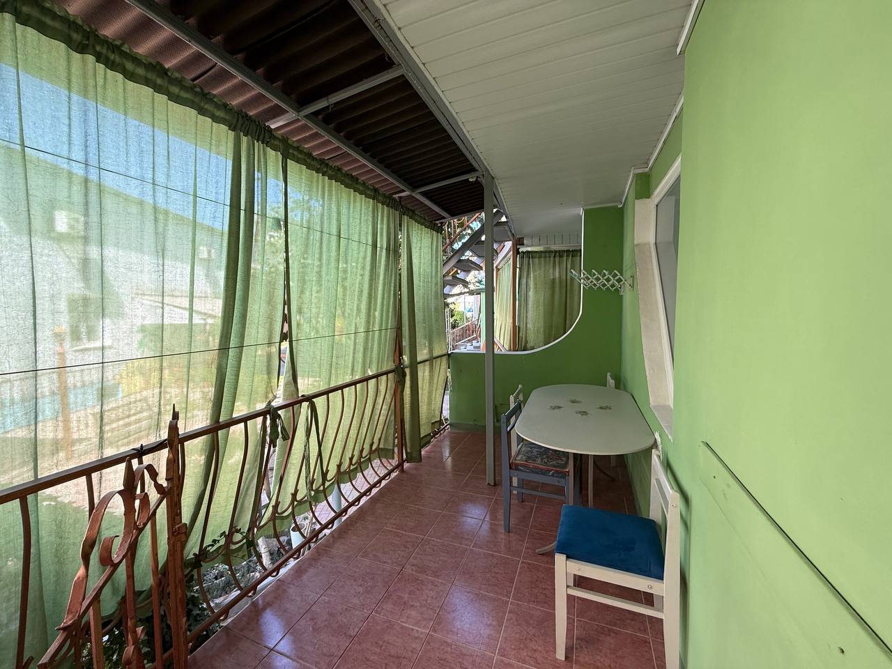 Фото Зеленый дом у маяка