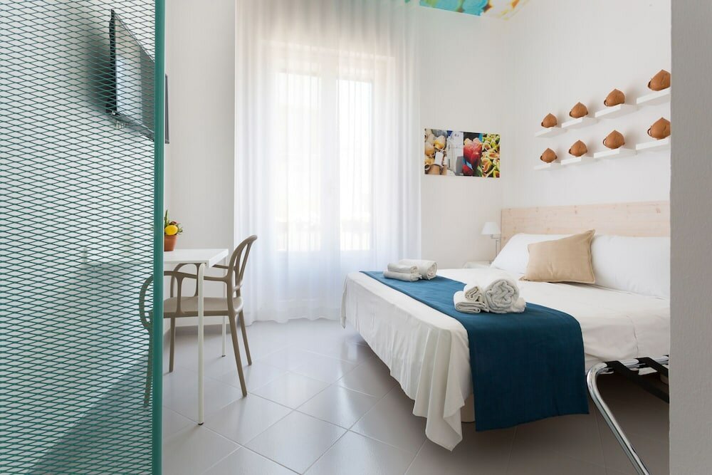 Фото Hotel L'Uomo e il Mare