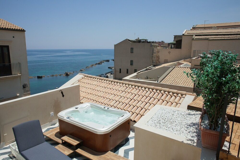 Фото Algila' Ortigia Charme Hotel