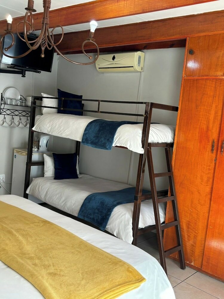 Фото Angels Haven Guesthouse