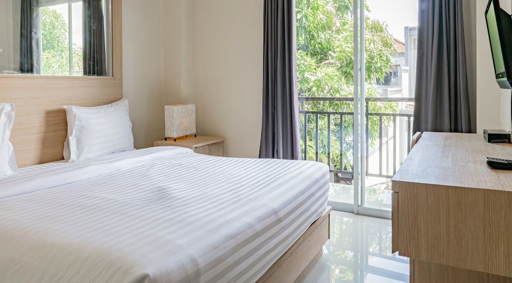 Фото Kuta Airport Insta Hotel