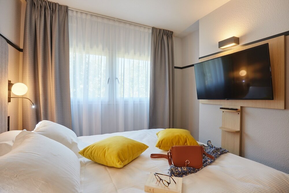 Фото Appart'hôtel Odalys City L'Atrium