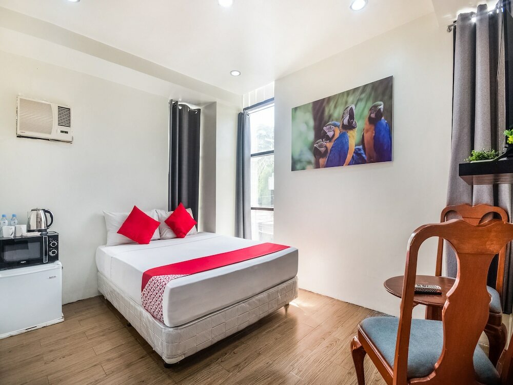 Фото Oyo 443 Maria Cristina Arcade Suites