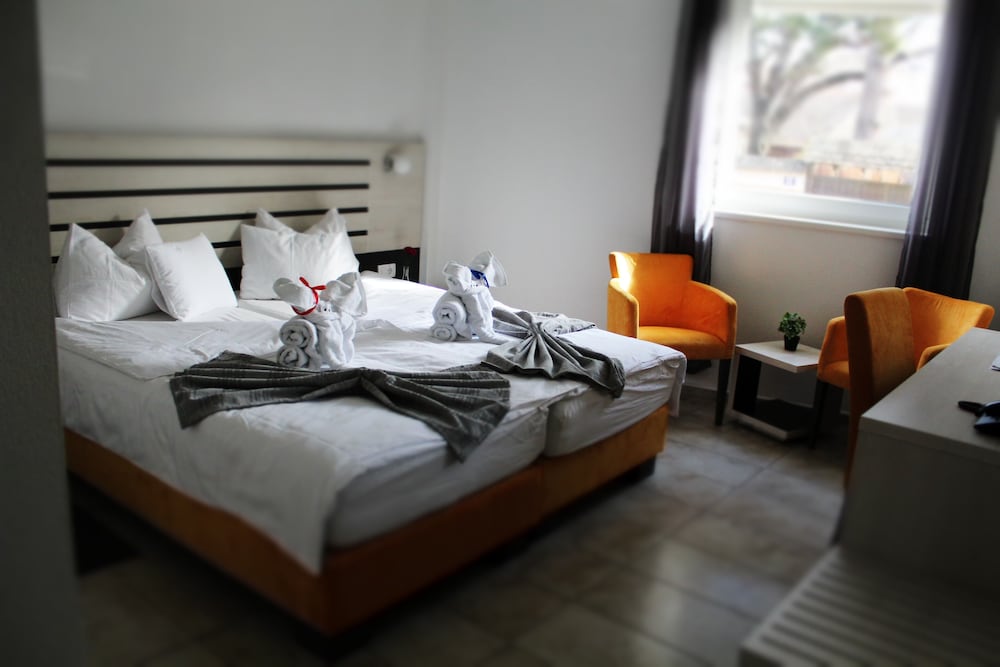 Фото Garni Hotel 11Tica DM