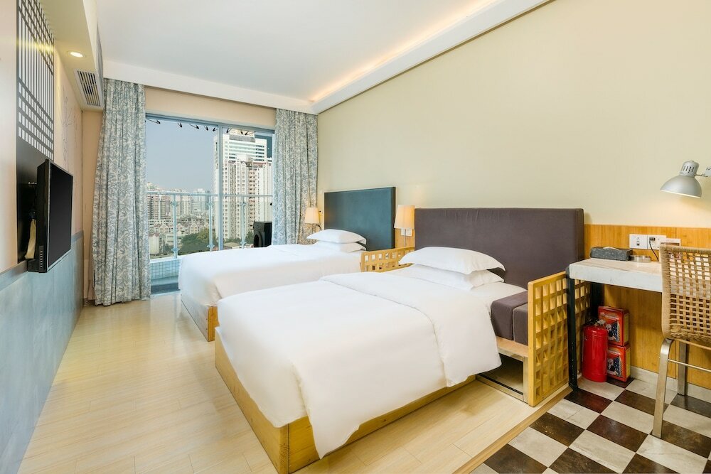 Фото Guangzhou Timmy Hotel