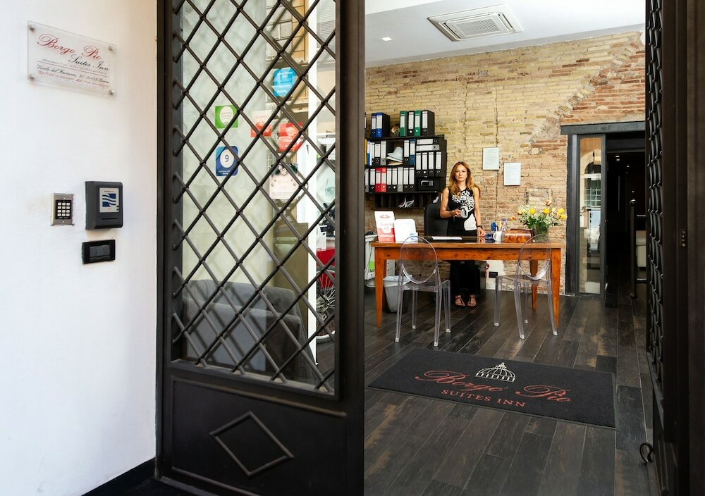 Фото Borgo Pio Suites Inn