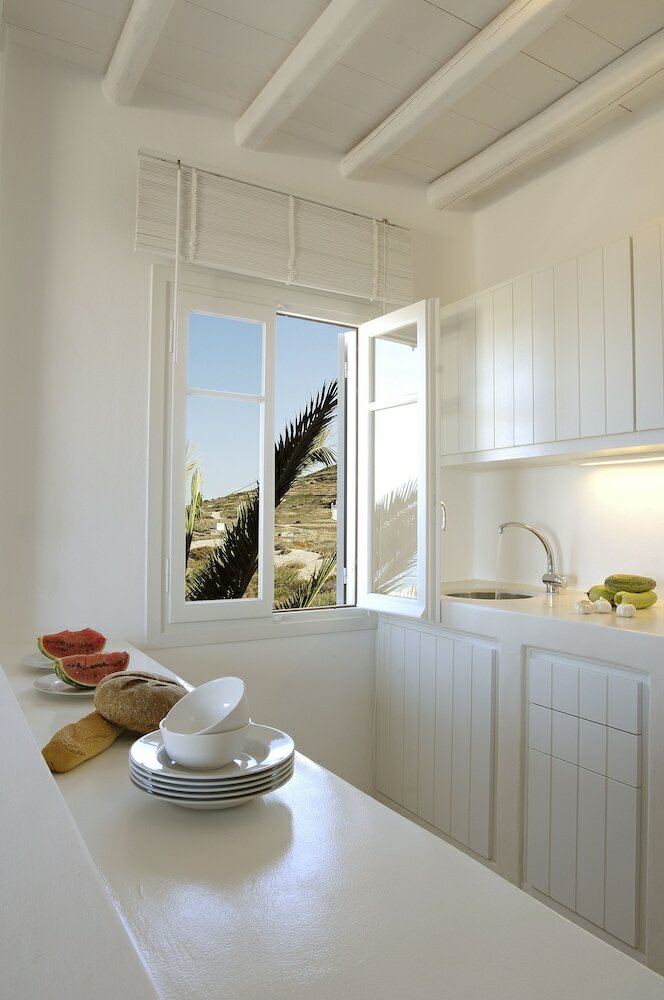 Фото Kapetan Tasos Suites