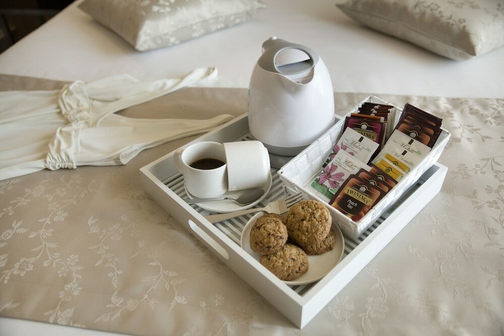 Фото Unicum Roma Suites