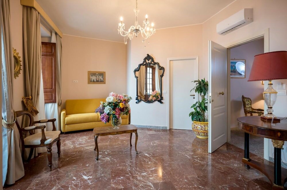 Фото Porta Di Mezzo Luxury B&b