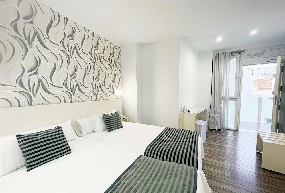 Фото Hotel La Boutique Puerta Osario