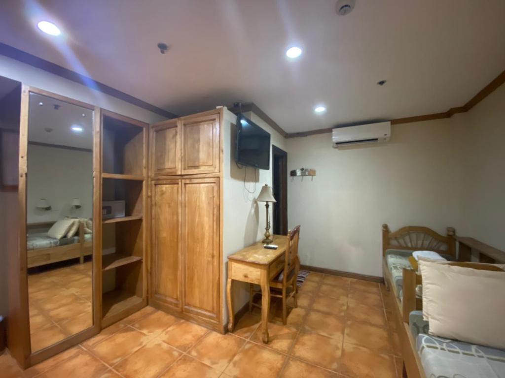 Фото Oyo 797 Brickwood Suites