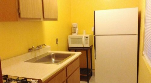 Гостиница Oceanside Inn and Suites в Оушенсайде