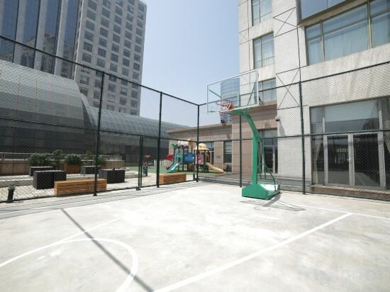 Фото Somerset Grand Central Dalian