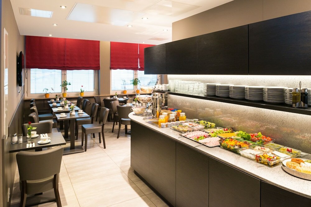 Фото Munich Inn Design Hotel