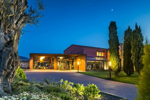 Внешний вид отеля Sallés Hotel Mas Tapiolas в Санта-Кристина-да-Аре, фото 1