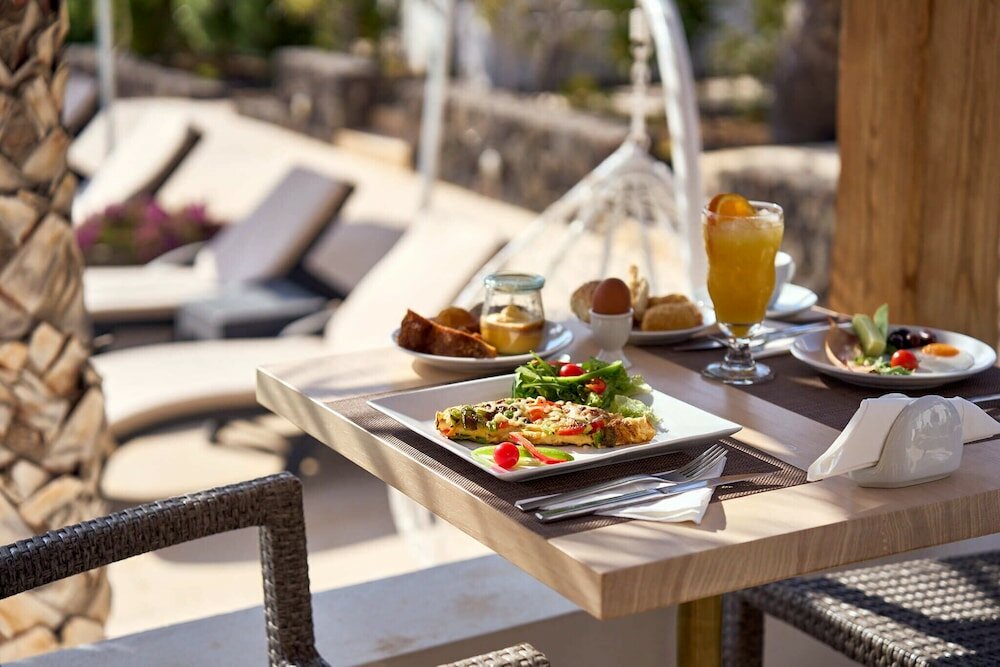 Фото Aurora Luxury Suites