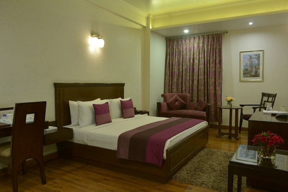 Фото Hotel Rockland Panchsheel Enclave