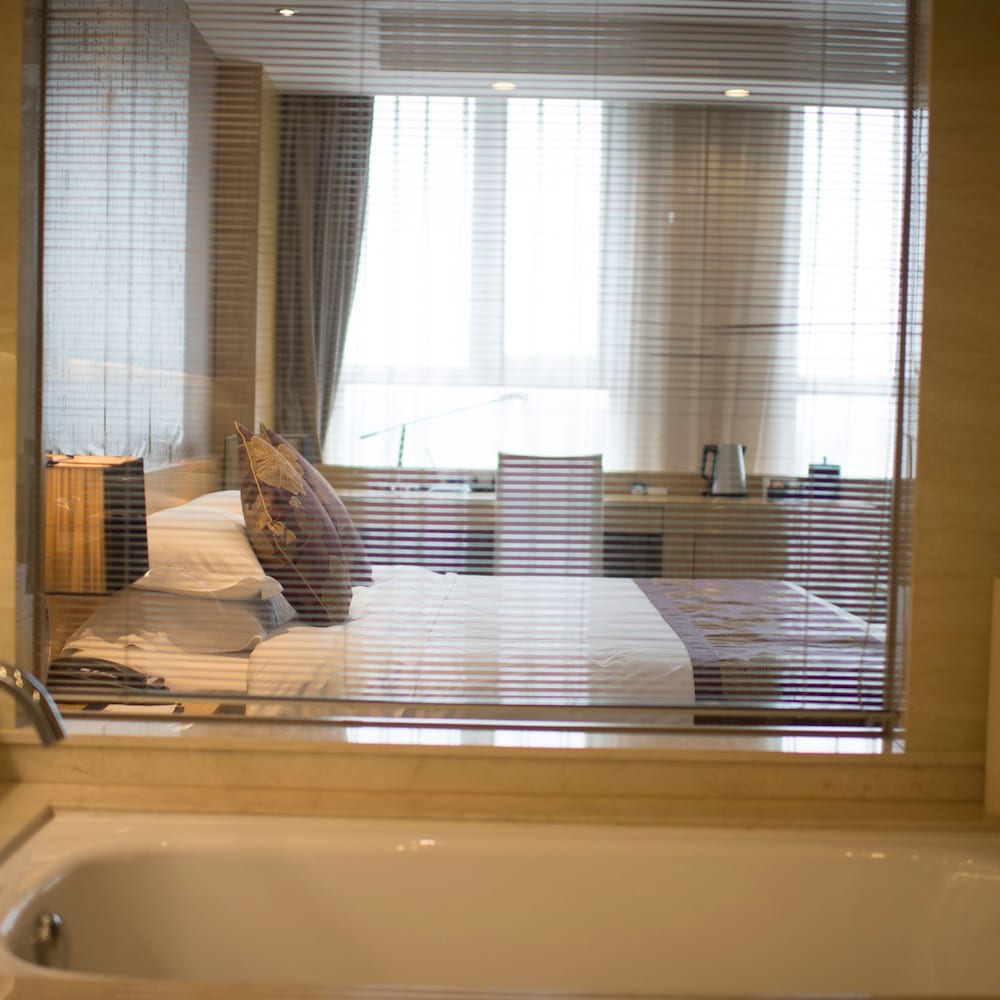 Фото Suzhou Sun Plaza Hotel