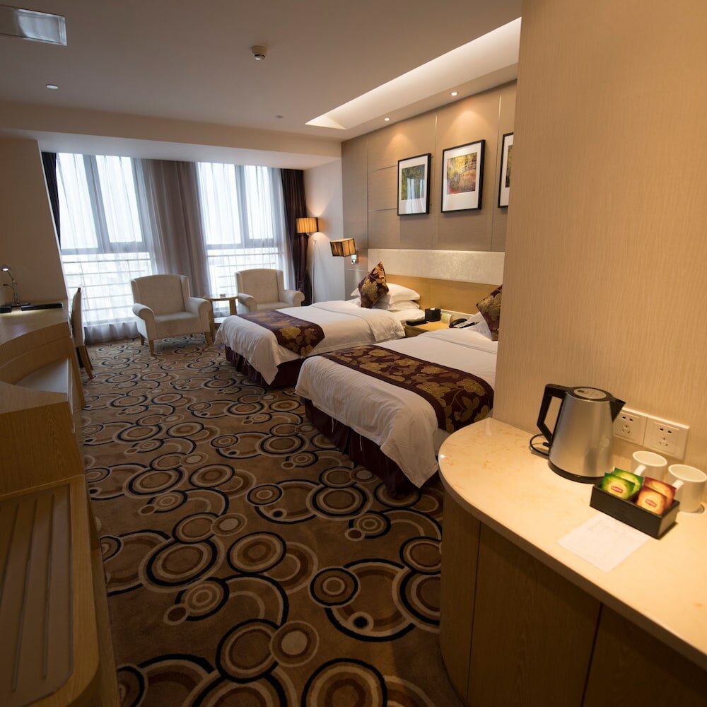 Фото Suzhou Sun Plaza Hotel