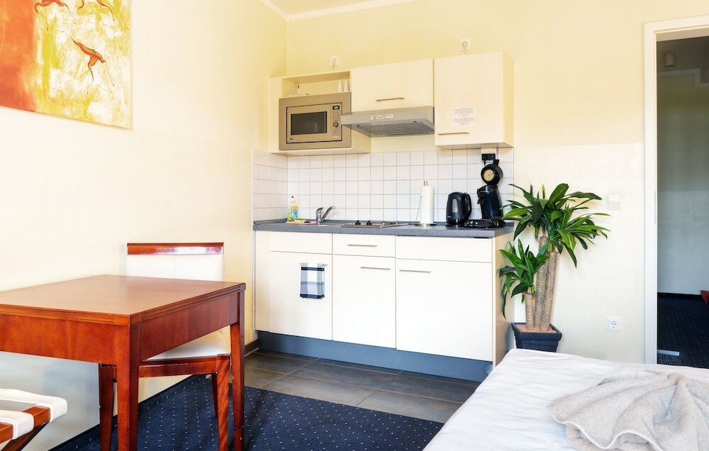 Фото AppartementHotel SchlafGut Leipzig