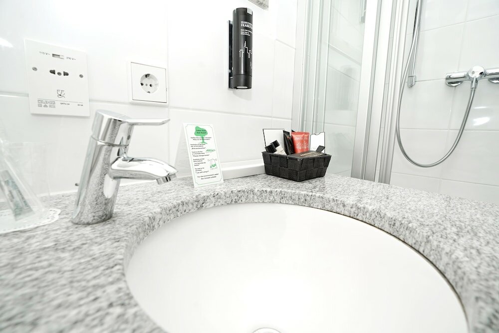 Фото The Atrium Hotel