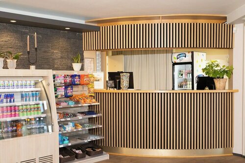 Гостиница Hotelli Jokipuisto в Кюменлааксо