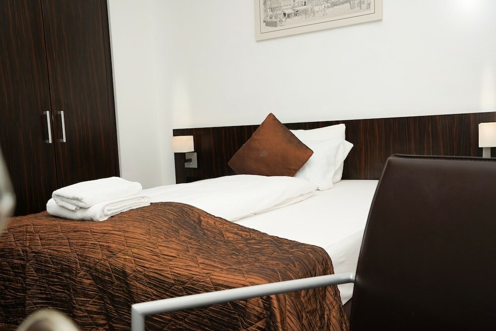 Фото The Atrium Hotel