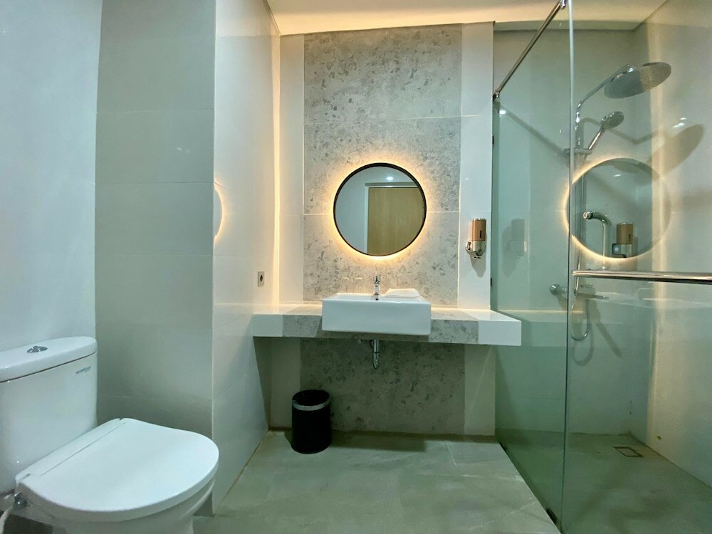 Фото Opi Indah Hotel