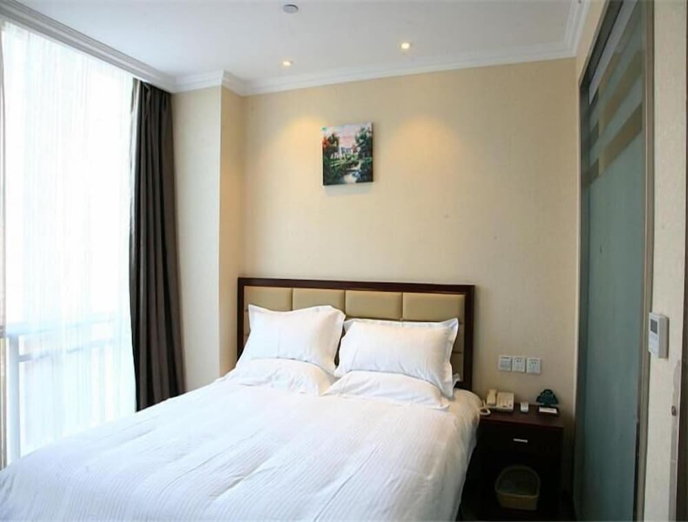 Фото GreenTree Inn Shaoxing Keqiao Xingyue Road Zhongqing Building Hotel