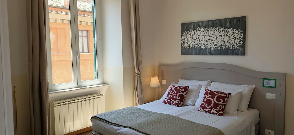 Фото Biancoreroma B&b