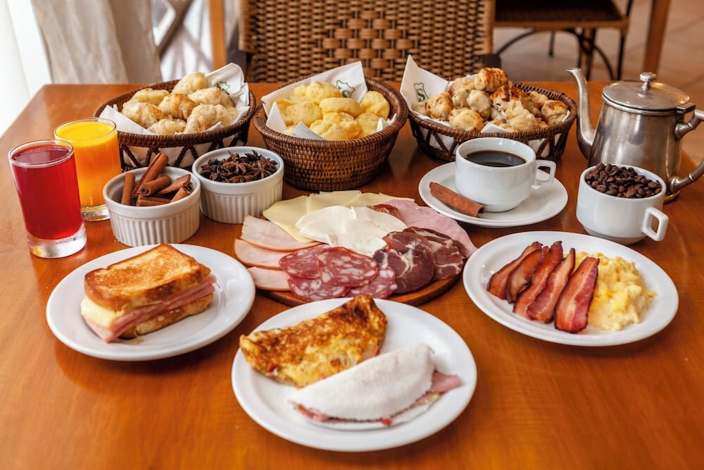 Фото Le Suisse Elegance Hotel