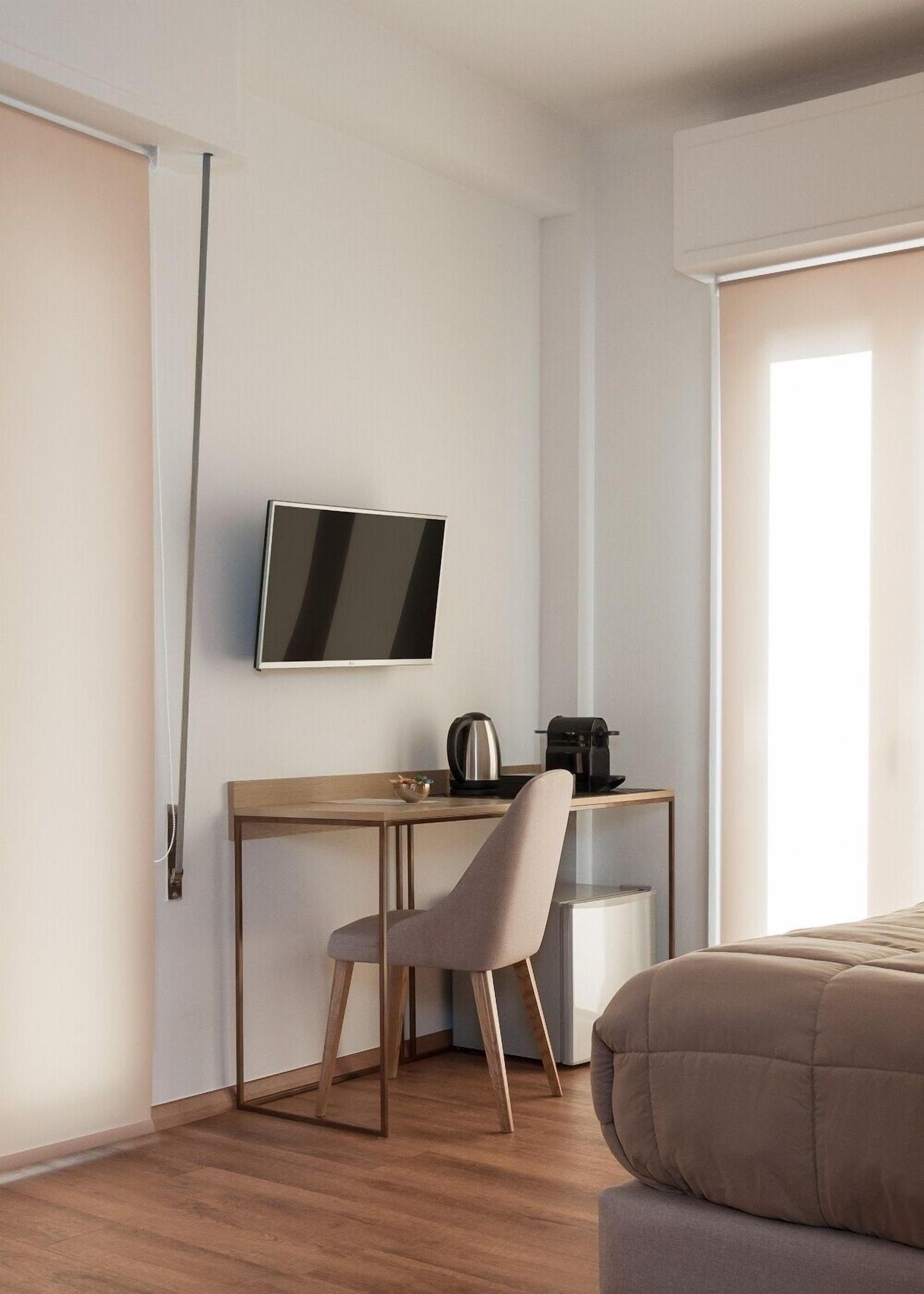 Фото Voulis Attico Rooms & Apartments