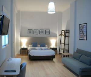 Гостиница La Perla Granada Suites