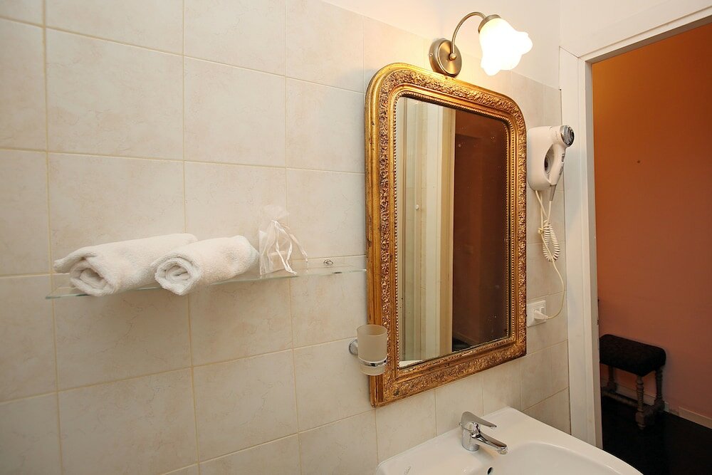 Фото Amica Rome Guest House