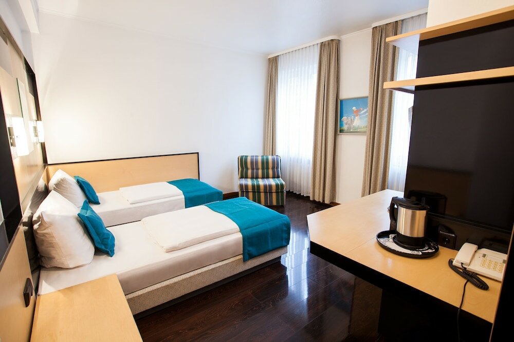 Фото Boutique 003 Koln am Dom