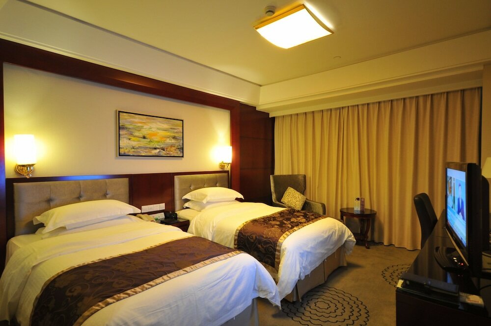 Фото Excemon Hefei Peace Hotel